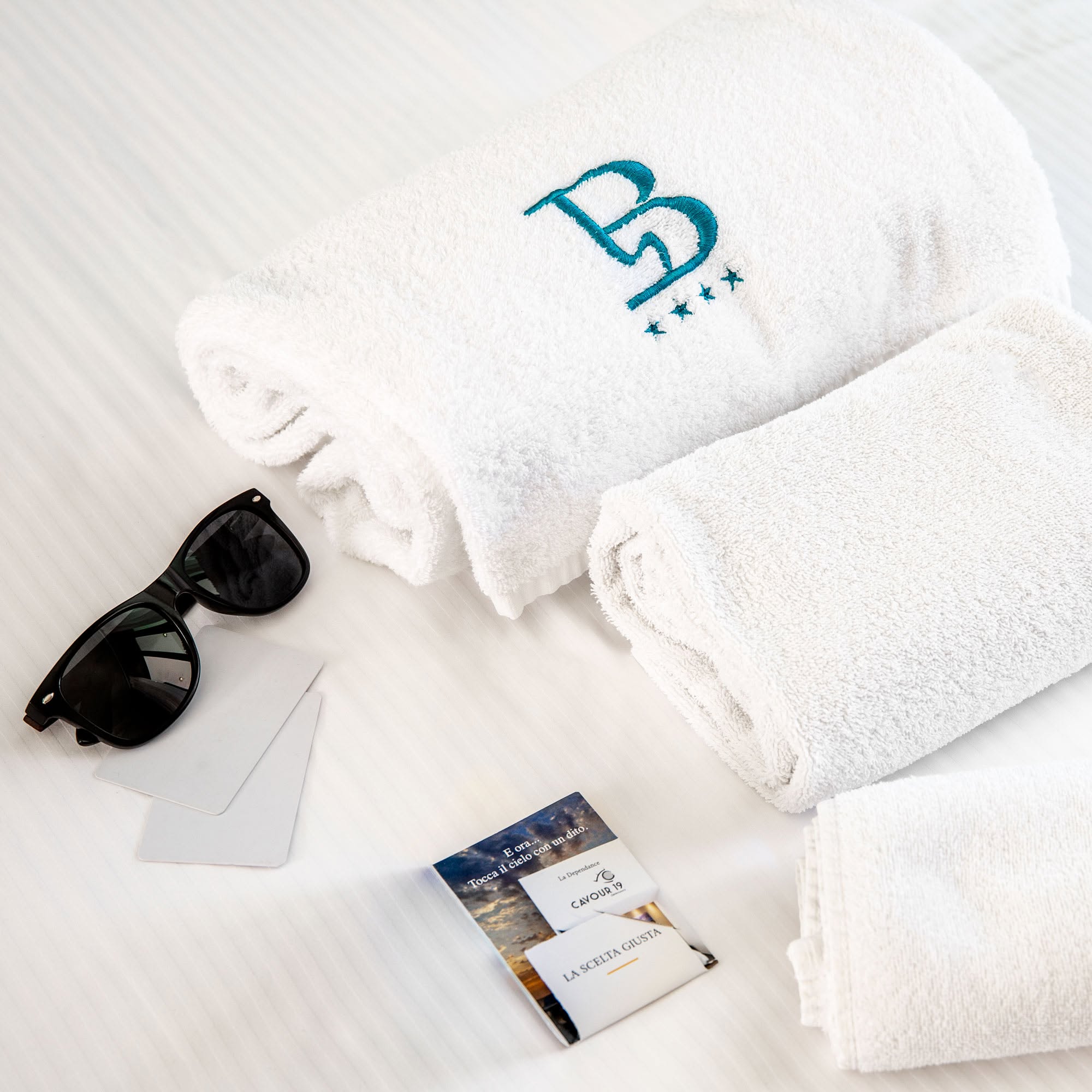 Teli da bagno ricamati con il logo B del Belvedere Hotel